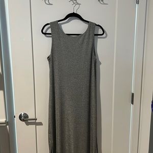 Silver sleeveless dress with slip inside. Backside is low cut. Size L